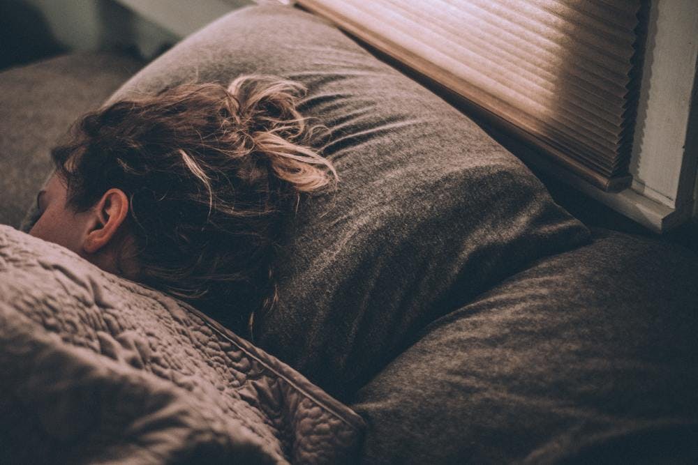 Women sleeping in a bed